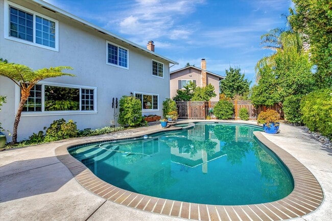 Building Photo - Executive Oasis l Huge Lot with Lush Green...