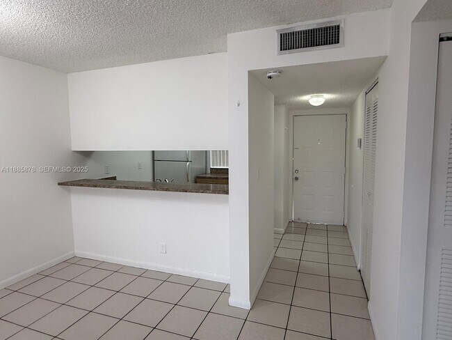 Building Photo - 8550 N Sherman Cir