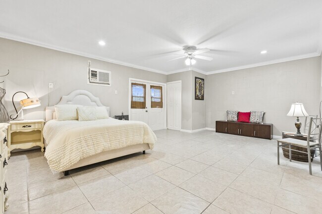 1st floor bedroom with patio access - 574 Ryans Woods Ln