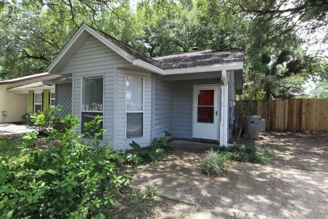 Building Photo - 2BR Home with Wood-Look Flooring, Fenced Backyard & Private Patio