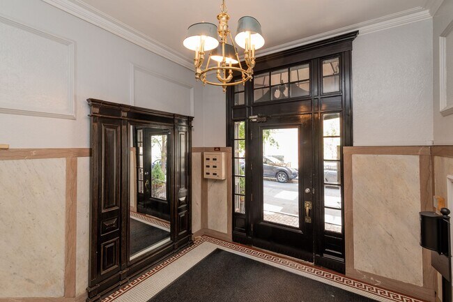 Building Photo - Nicely renovated studio in a prime location near the Green and Orange Line.