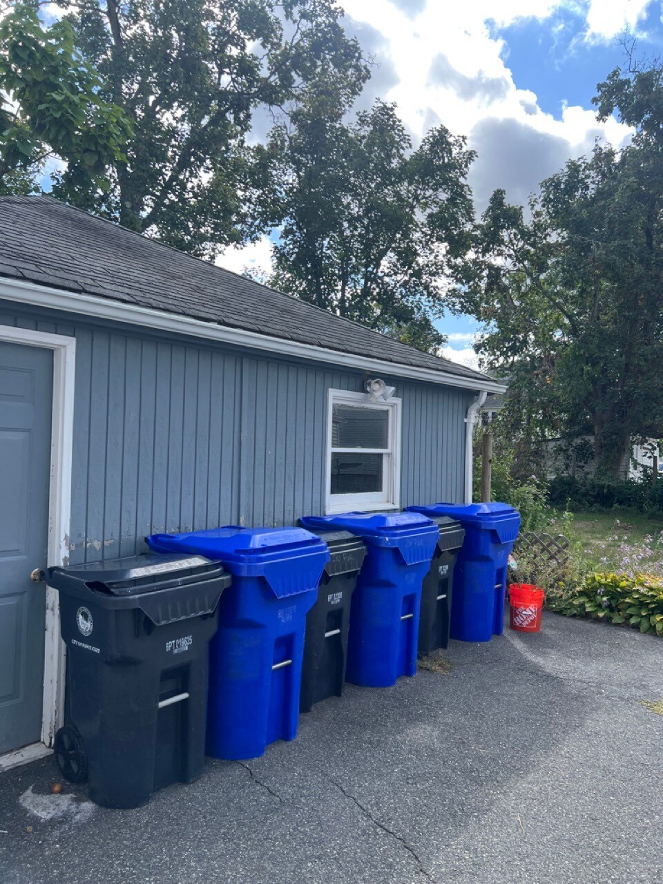 Each unit has indivdual trash bins and use garage as shared storage space. - 49 Elder St