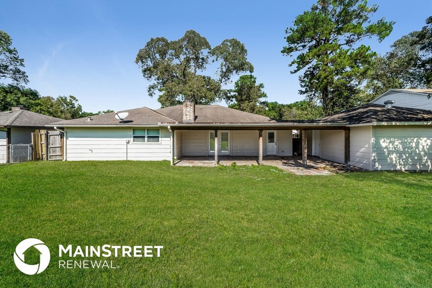 Building Photo - 10074 Woodhollow Dr