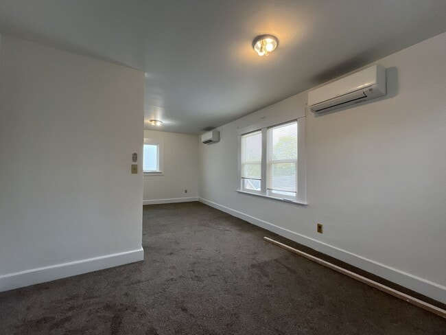 Building Photo - Expansive 4BR 2,900+ Sq Ft Home with Theater-Style Living Room & Bonus Hobby Workshop