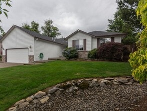 Building Photo - Charming 4-Bed, 2-Bath Home with Vaulted Ceilings, Dual Fireplaces & Serene Outdoor Spaces