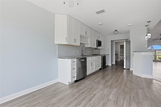 Building Photo - 5207 86th St Ct W