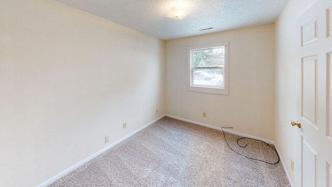 Building Photo - 3 Bedrooms with In-Unit Laundry