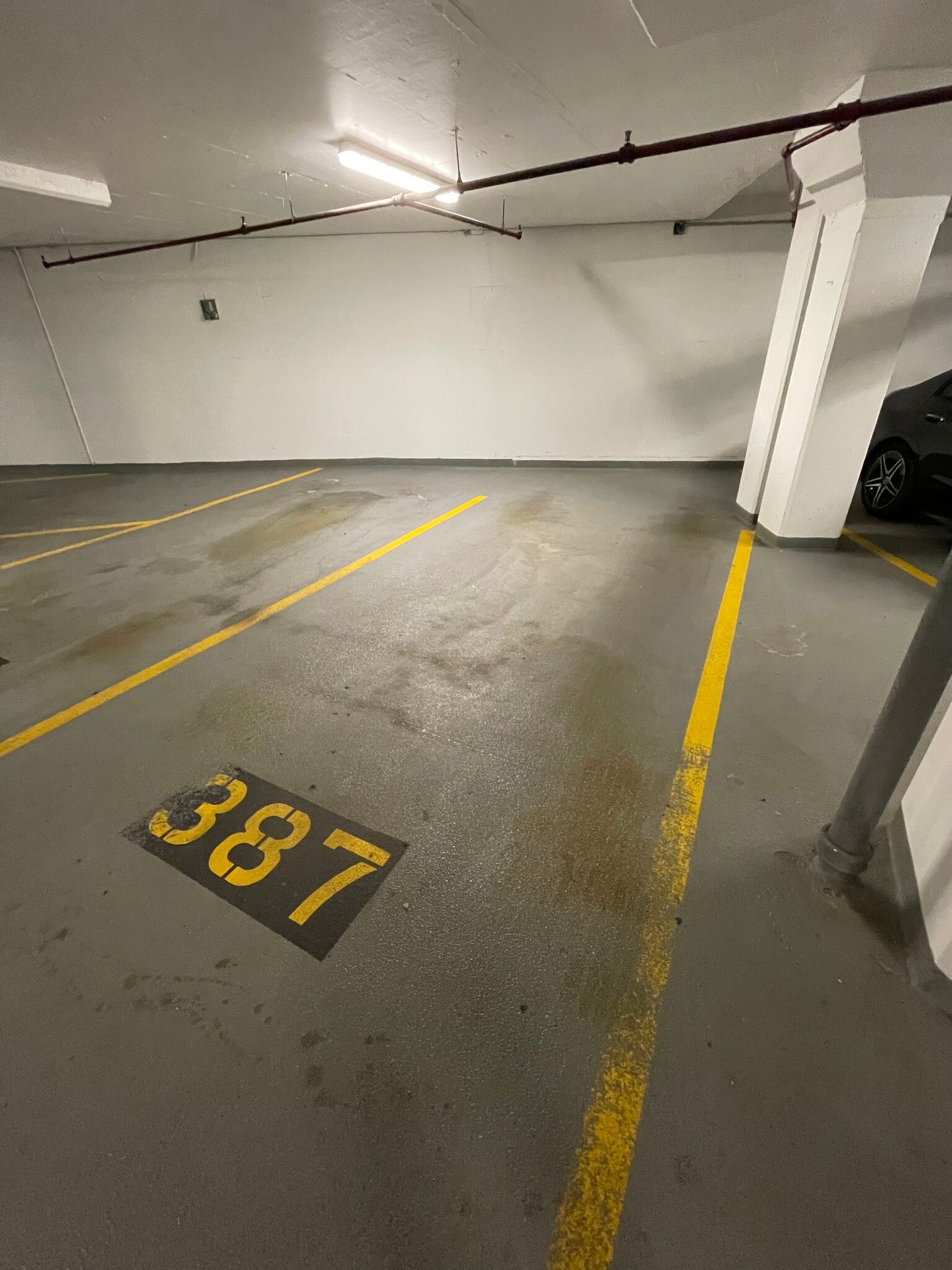 Covered parking spot in garage - 4201 Cathedral Ave NW