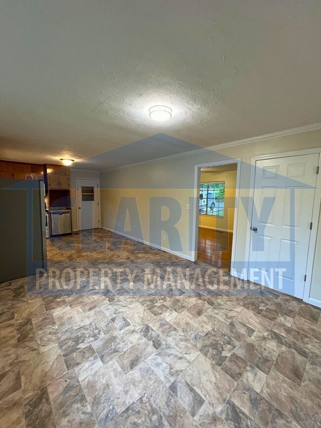 Building Photo - Three bedroom home w/ lots of storage!