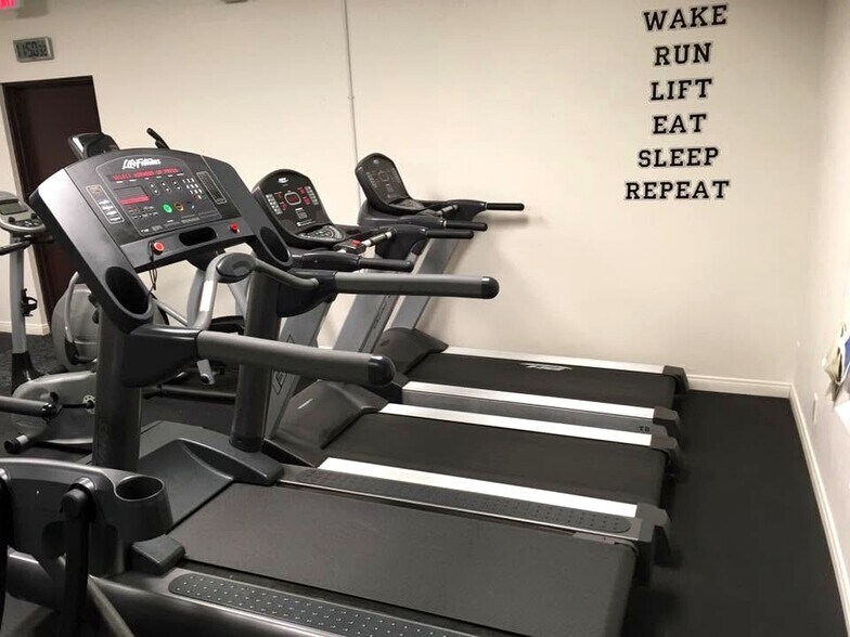 Fitness center with cardio equipment - 8305 Summertime Ln