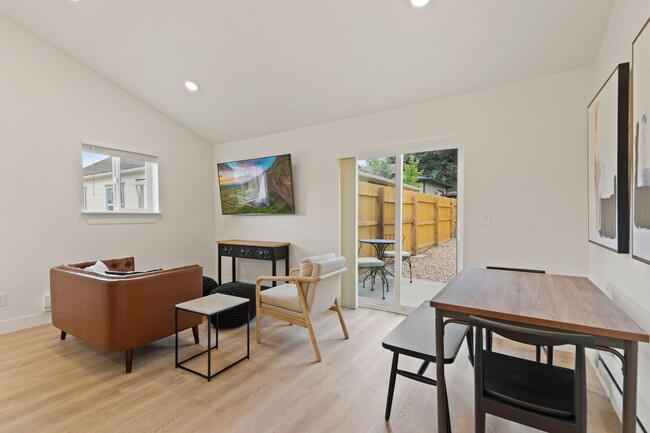 Living and dinning room. 65" Smart TV - 121 2nd St SE