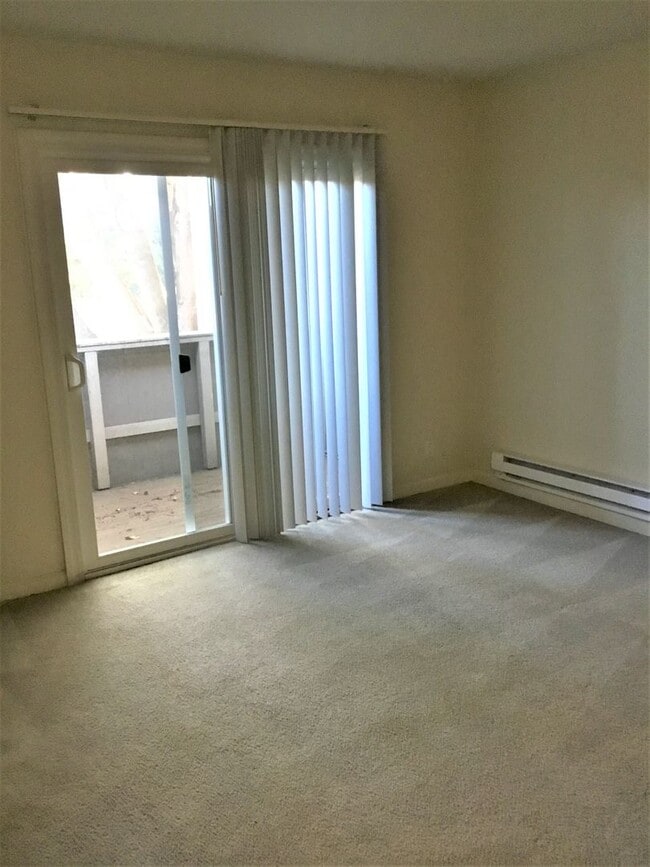 Building Photo - Studio at Baywood Villas