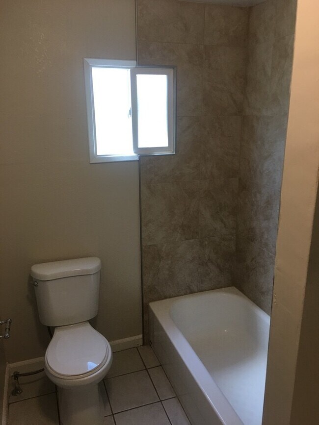 Building Photo - Available Soon! WITH HVAC