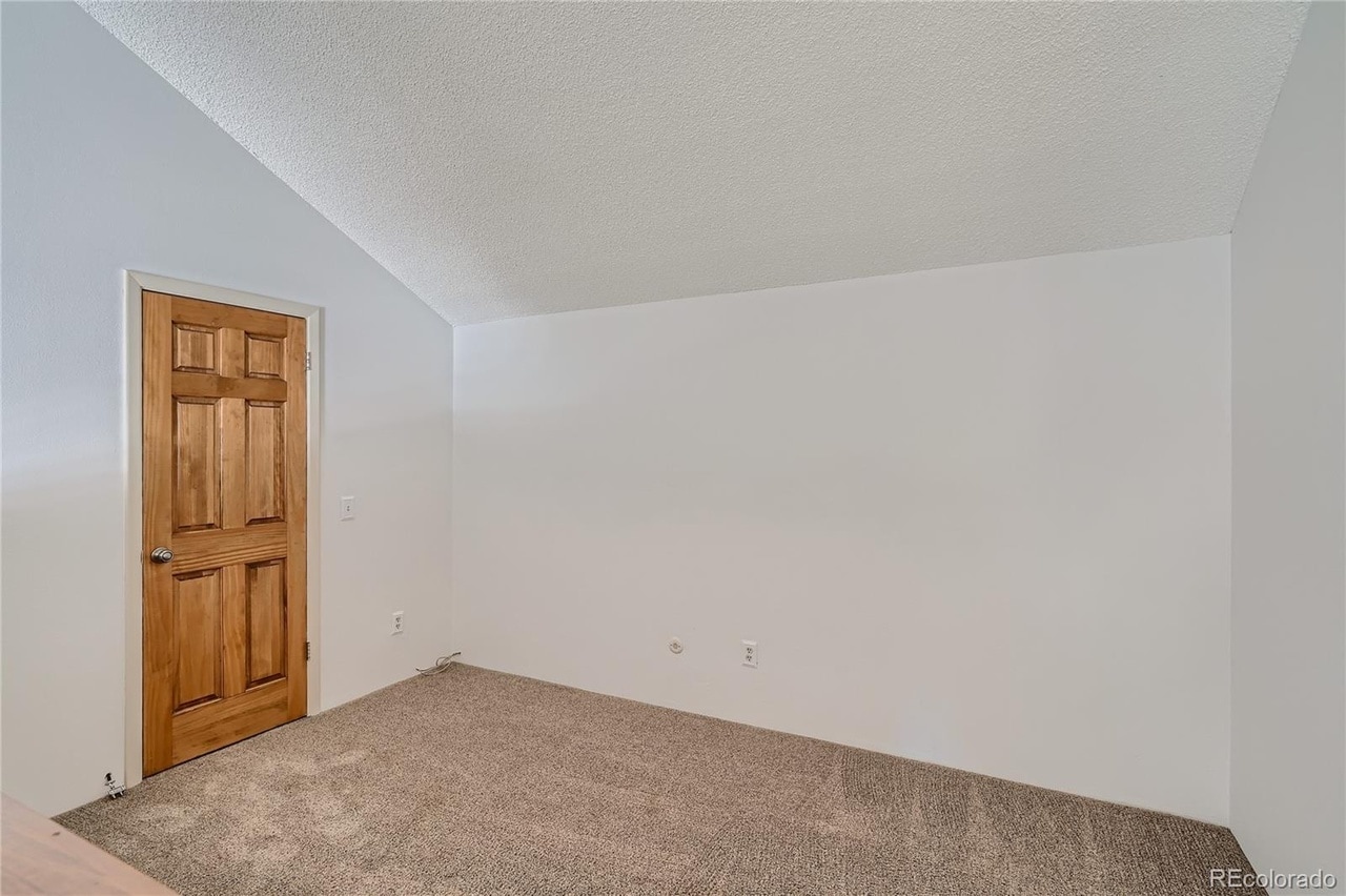 Loft for non-conforming 2nd bedroom and/or home office. Closet door on the left - 14282 E Tufts Pl