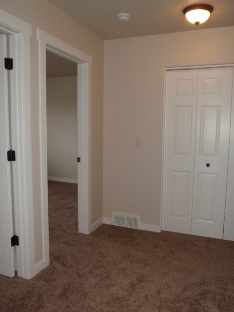 Building Photo - Newer house with attached garage. Half mon...