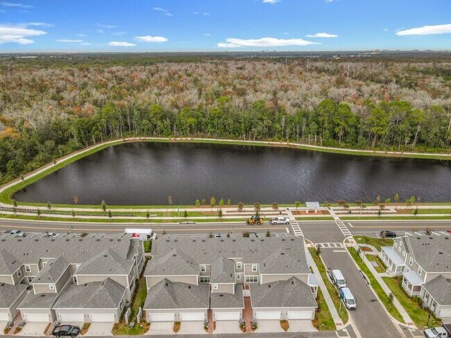 Building Photo - New Luxury Townhome in Celebration with All porcelain tiled floors. Island Village new construction