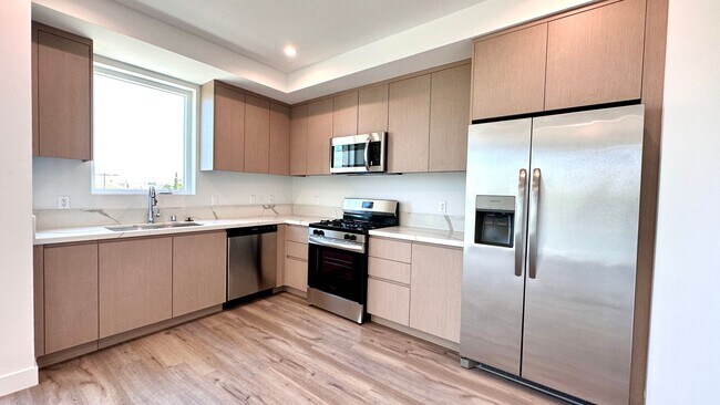 Building Photo - Affordable 1-Bedroom Top Floor Unit with M...