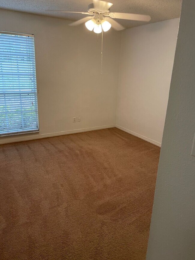 Building Photo - Ground Floor Two bedroom condo
