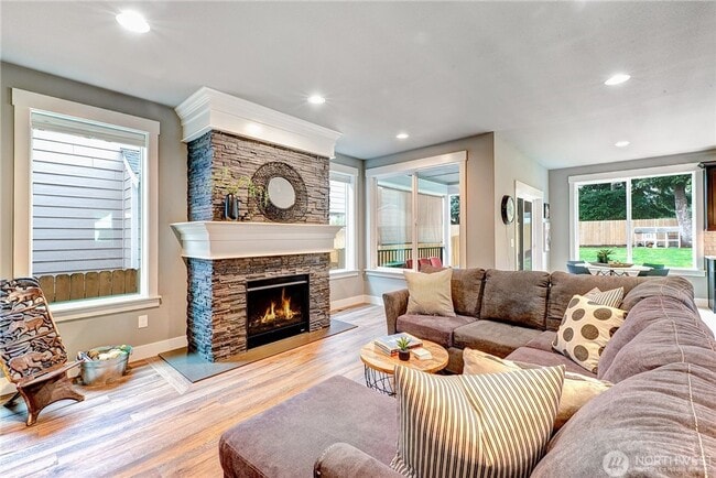 Building Photo - Luxury NW Living: 4 Bedroom Masterpiece with Dual Suites and Private Yard in Desirable Browns Point!