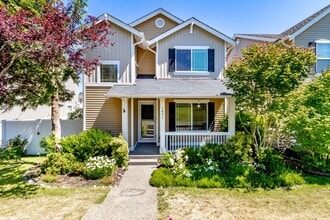 Building Photo - 3 bedroom, 2.5 bath DuPont home featuring AC!