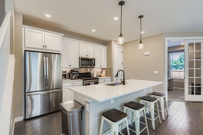 Building Photo - Welcome to this Beautifully Maintained 4-B...