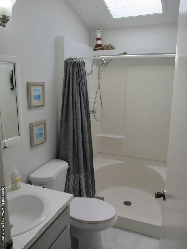 Building Photo - Charming Partially Furnished Waterfront Ho...