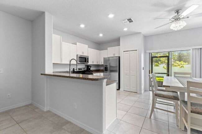 Building Photo - NEWLY UPGRADED Town Home For Rent in Touchstone!