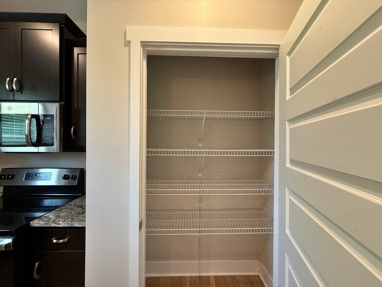 The large pantry offers abundant storage space. - 3010 Bellflower Cir