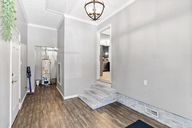 Building Photo - Spacious 4-Bedroom Haven with 3 Full Baths...