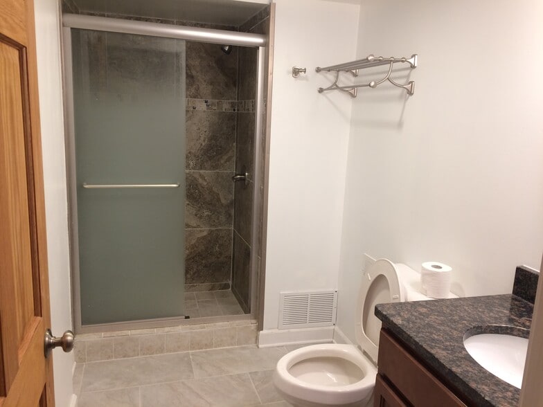 Lower level walkout Studio bath room - 1002 Myron Ct
