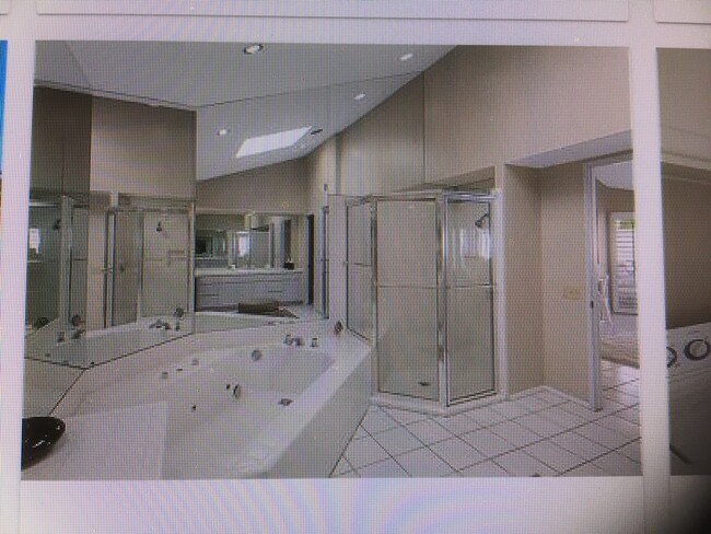 master bath & shower/ also has 2 sinks. - 54865 Inverness Way