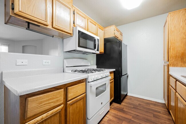 Building Photo - Like-New 2BR/2BA Condo in Gated Manzanita Community – Vaulted Ceilings & Fireplace!