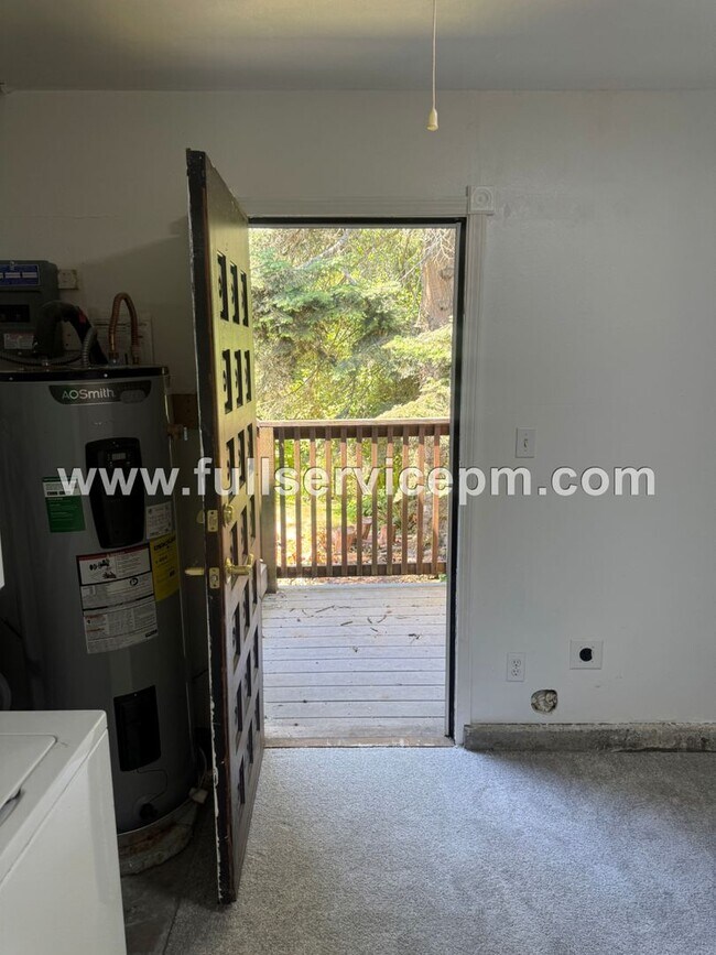 Building Photo - Spacious 4-Bedroom Upper-Level Home with Fireplace, Bonus Room & Large Deck