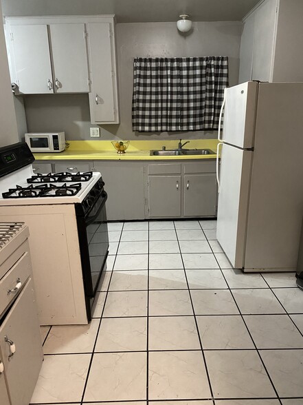 Large spacious kitchen w/ two refrigerators . - 2220 Gale Ave
