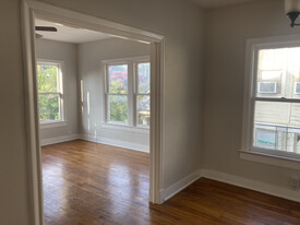 Spacious living room and dining area with loads of natural light - 266 Post Ave