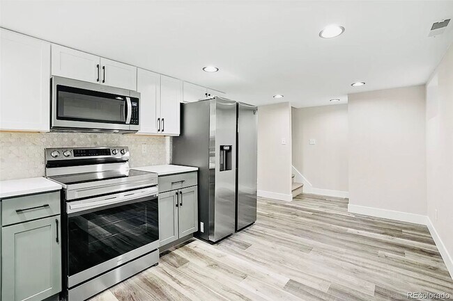 Building Photo - Beautiful 2 Bed 2 Bath With Bonus Living Space in Denver's Clayton Neighborhood