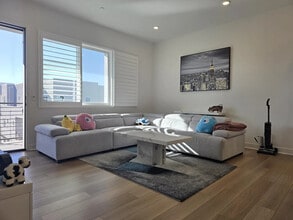 Building Photo - Bright 1-Bed Top-Floor Haven w/ In-Unit Laundry, Central AC & Attached Garage – Valencia