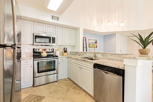 Building Photo - End-Unit 3-Bed Condo Near Downtown Naples & Beaches | Gated Resort-Style Community