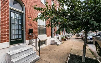 Building Photo - Charming 2bdrm 2.5 bath Patterson Park home with parking and rooftop deck