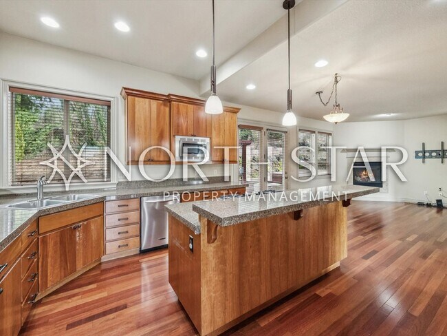 Building Photo - Elevated Forest Heights Retreat with Stunning Valley Views & Versatile Living Spaces