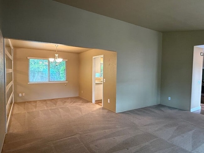 Building Photo - OPEN HOUSE this Wednesday 5pm-6:30pm - Private Redwood Setting | 4BR Home with Family Room, Bar &...