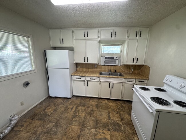 Building Photo - Corner House Located Near Clapp Park & Minutes From Texas Tech Campus!