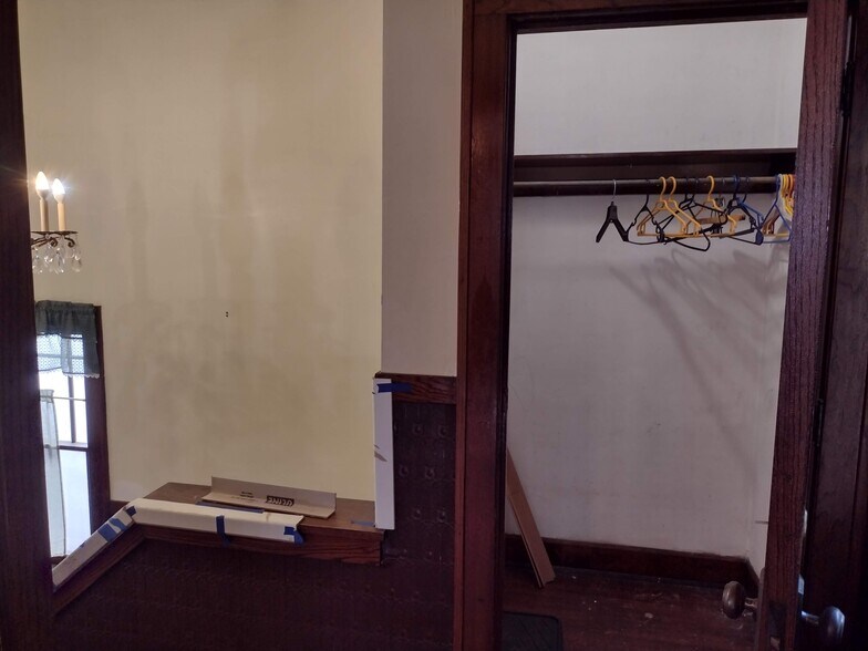 Closet in front stairwell - 1895 Portland Ave