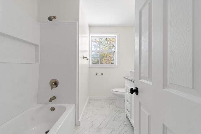 Building Photo - Pet Friendly Renovated Three Bedroom with Basement!