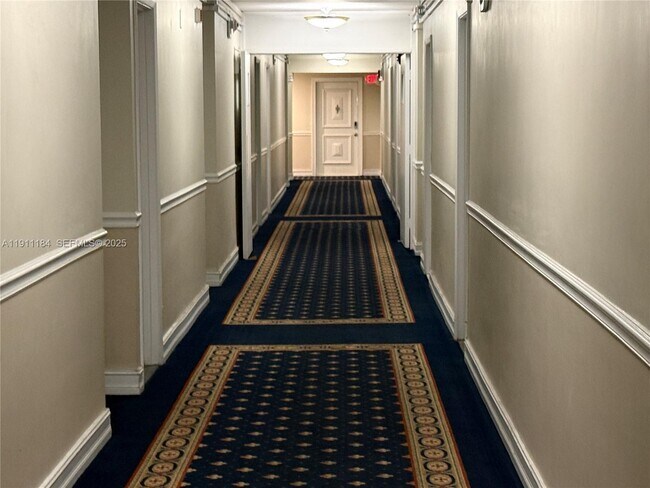 Building Photo - 5005 Collins Ave