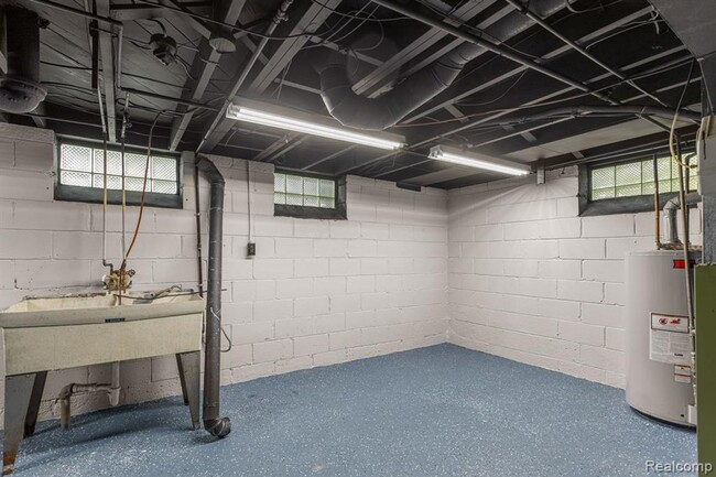 Building Photo - Cozy & Modern: 2-Bed Brick Home with Garage & Finished Basement