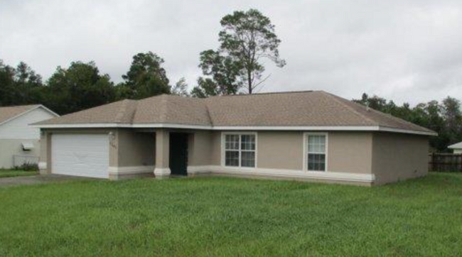 Building Photo - Fenced & Tiled 3/2/2 Summerfield Home For ...