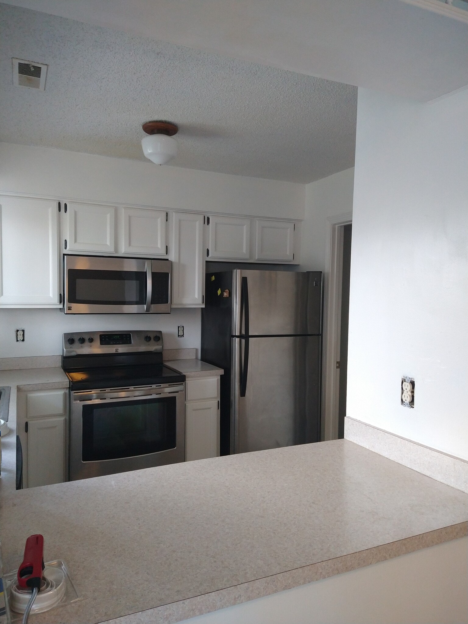 Stainless steel appliances stairs - 2406 Alabama St