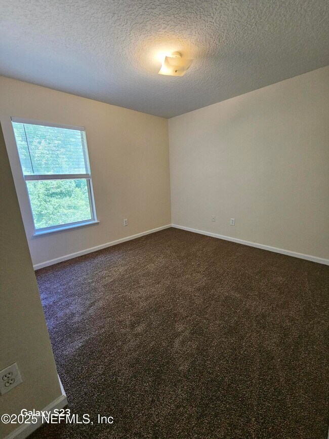 Building Photo - 6965 Ortega Woods Dr