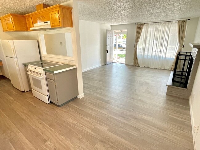 Building Photo - Centennial Remodeled Ranch Home with Large, Fenced Backyard, Attached Garage, Laminate Hardwoods